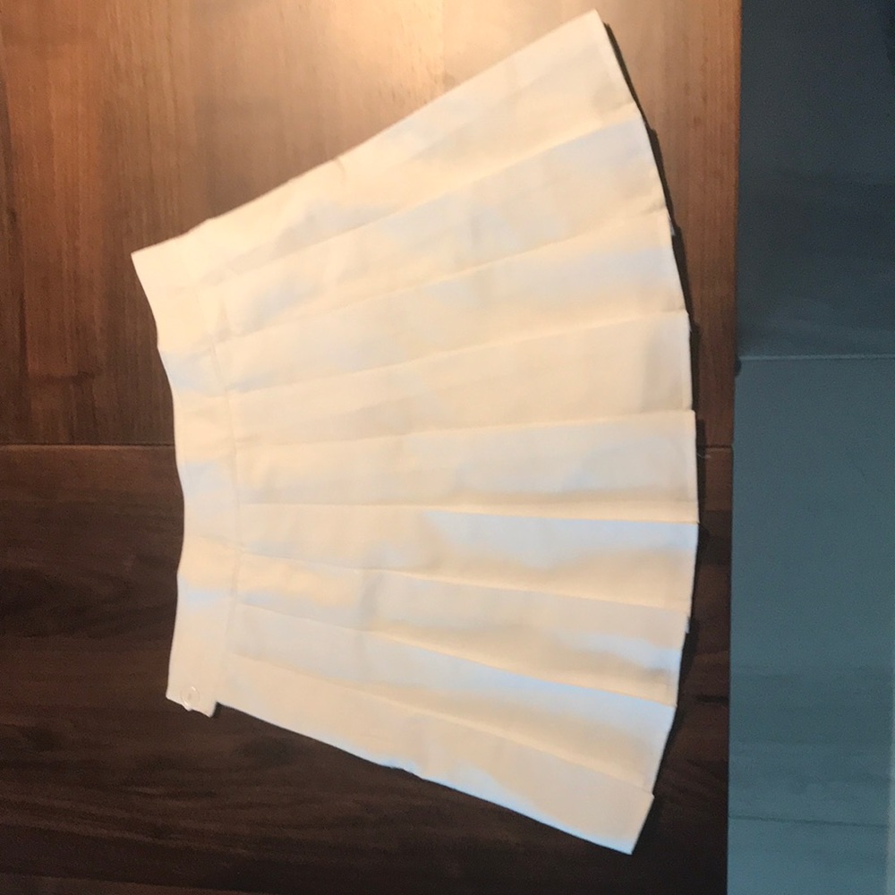 White pleated skirt